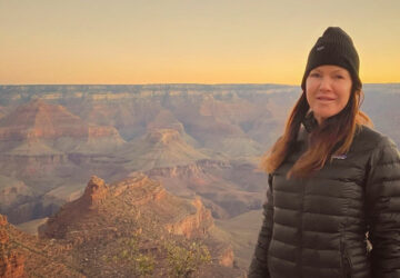 Kira Reed Lorsch looking over the rim of the Grand Canyon